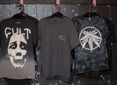 Three T-shirts for sale at Gold Blood. Photo: John Barkiple