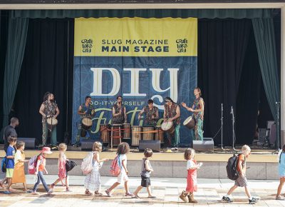 Drummers entertain kids on their way to the Kids' Area. Photo: @william.h.cannon