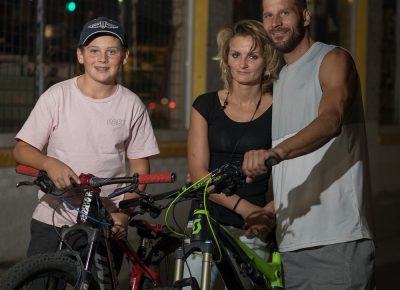 Tylan, Elizabeth and Justin check out Gold Blood’s opening. Tylan races BMX in Herriman. Photo: John Barkiple