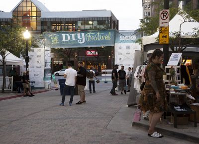 Patrons hang out near the south entrance of the festival. Photo: @jbunds