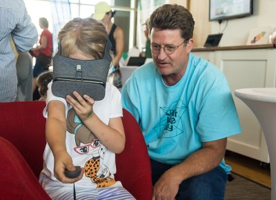 A little girl experiencing virtual reality. Photo: @colton_marsala