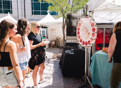 Attendees are invited to spin a wheel to with a prize at Skinworks. LmSorenson.net