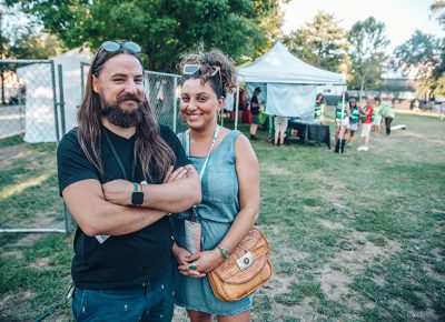 (L–R) "DFS" as I know him and friend Kaneischa enjoying the concert on this fine summer evening at Pioneer Park. DFS is the brain parent of a musical project titled Man Kitten, which is a beautiful mixture of jazz and French folk music. Photo: johnnybetts.com