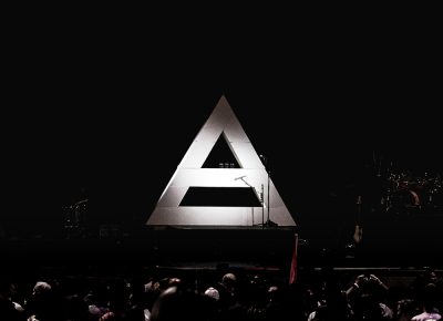 A lit pyramid appears centerstage in the darkness before Thirty Seconds to Mars take the stage. Photo: Lmsorenson.net