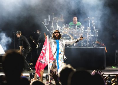 Fans wave flags and chant and sing along as Thirty Seconds to Mars play. Photo: Lmsorenson.net