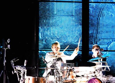 Drummer Dominic Howard playing onstage at USANA. Photo: Lmsorenson.net