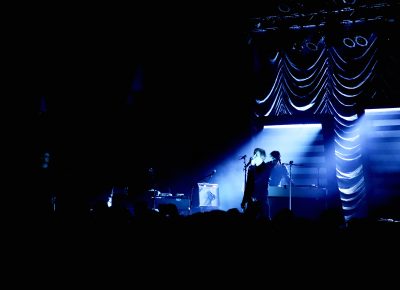 Britt Daniel singing in the darkness to the fans. Photo: Lmsorenson.net