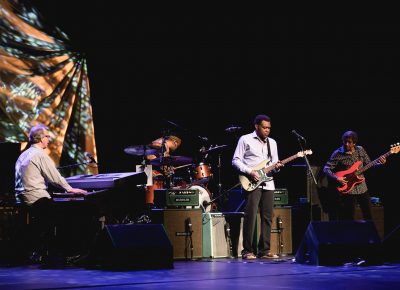 Robert Cray and his band playing onstage at the Eccles Performing Arts Center. Photo: @Lmsorenson.net