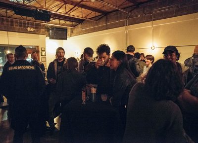 A crowd enjoying the drinks and food in the tarot lounge of RYE. Photo: Will Cannon