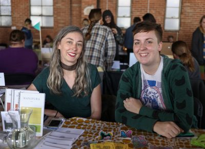 (L-R) Brinley Froelich and Eliza McKinney collaborated on their decarcerate zine. It calls attention to law enforcement abuses and the lasting impact of prison sentences/culture. McKinney has been interested in zines for five years, and she discovered independent publishing through teenage girl comics on Tumblr.