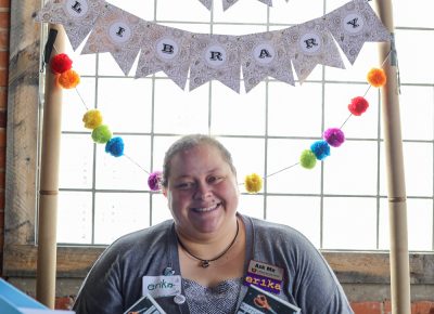 Erika Church covers the circulation desk for the Marriott Library’s zine collection. Any Utah resident is invited to view the collection on the University of Utah campus, though some restrictions apply to non-students.