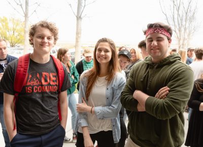 Matthew, Veronica and Harrison are at the front of the line, and probably have been waiting all day—super fans! Photo: Lmsorenson.net