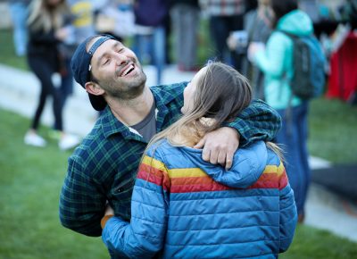 (L–R) Travis and Tracee look adorable from every angle. Travis is from Hawaii, and he’s happy to relax on the plaza in cool weather. After a rainy start, the sun came out in the evening, and the crowd continued to swell. Photo: John Barkiple