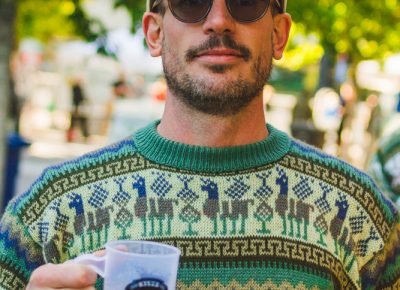 Strap Tank head brewer Mike Dymowski rocks the llama sweater after his recent trip to Peru, where he became inspired to explore new beer flavors. Photo: Talyn Sherer