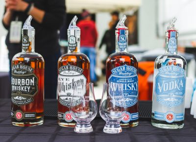 Sporting their new labels, Sugarhouse Distillery samples up their new whiskey collection. Photo: Talyn Sherer