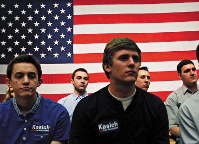 Spectators watch Republican presidential candidate Ohio Gov. John Kasich speak at a town hall event at Utah Valley University, Friday, March 18, 2016, in Orem, Utah. Photo: Kim Raff for, AP Photo