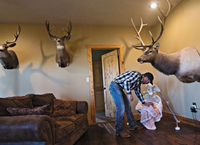 Andy Johnson tends to his baby daughter, Brookley Johnson, in their living room in Fort Bridger, WY on Thursday, September 3, 2015. Andy Johnson is a landowner who has become a conservative cause celebrity in the Western wars with the EPA. He dammed a stream to build a stock pond on his land, and in doing so, drew a thumping from the EPA, which ordered him to demolish it or face fines of $37,500 a day. He's dug in his heels and refused for two years, and decided to sue the feds. Photo: Kim Raff, for The New York Times.