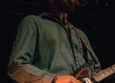 Frank McElroy lending rhythm riffs and harmonies. Photo: Matthew Hunter