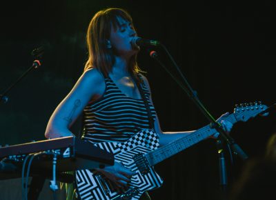 Jenn playing one of two custom Reverend guitars. Photo: Matthew Hunter