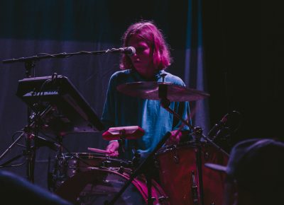 Madeline Kenney drummer keeping it simple and holding it down left handed. Photo: Matthew Hunter