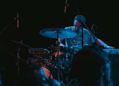 Andy Stack splitting focus between drums and keys. Photo: Matthew Hunter