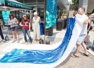 A sun printed cyanotype in its final stages.