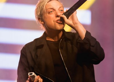 Robert DeLong enters on stage with a microphone and Wii-remote in hand ready to melt your ears off. Photo: Logan Sorenson | Lmsorenson.net