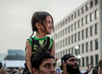 A young fan enjoying herself.