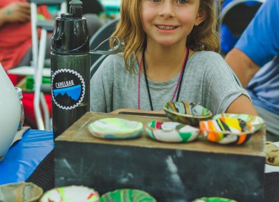 Lily Barney poses with her art.