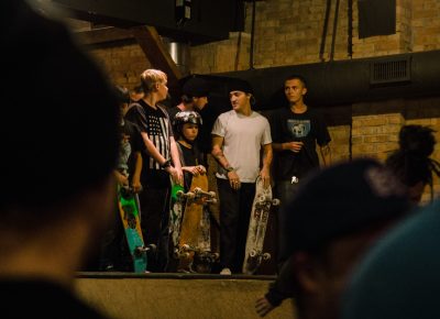 Skaters of all ages on the mini ramp.