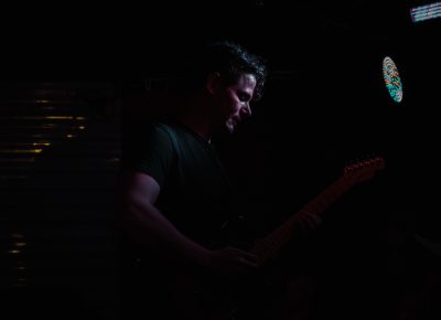 Peter, touring guitarist for Japanese Breakfast, taking to the pedestal for a guitar solo.