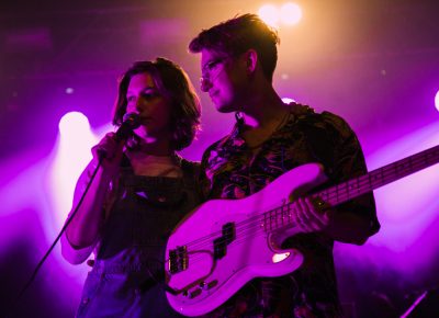 Mikaela and Logan buddying up during their set.