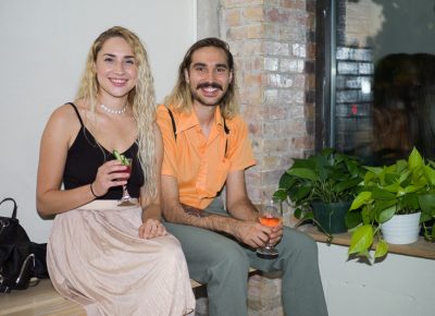 (L-R) Adrienne LaPointe and Jared Asplund sit by the large front windows. Photo: @clancycoop