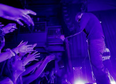 Fan handing Chase some red roses. Photo: @Lmsorenson Photography