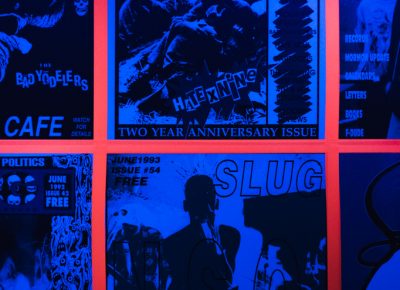 SLUG cover wallpaper is coming to a blacklight room near you!