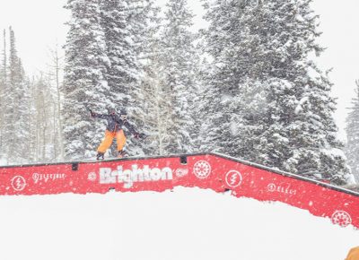 Ashton Davis with a boardslide on a flat down rail.