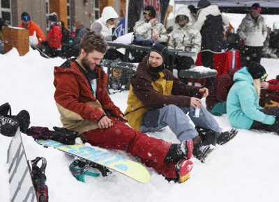 Friends enjoy their day in the snow.