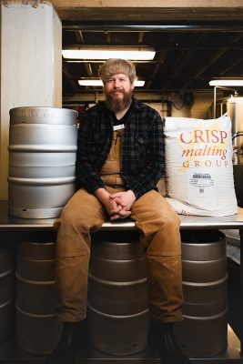 Chad Hopkins amongst his brewing gear. Photo: LmSorenson.net