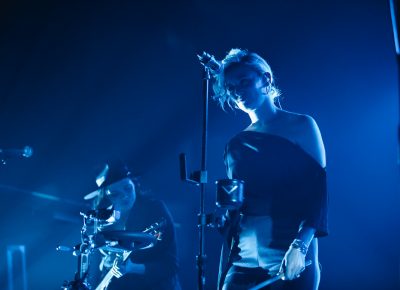 Back up vocal support for Hozier, playing in the blue backlight on the stage at the Union Event Center. Photo: @Lmsorenson