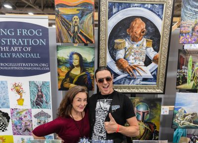 Artists Holly and Christopher posing in their pop-up shop in the Artist Alley. Photo: @Lmsorenson