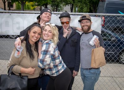 (L-R; T-B) Chris Martin, Kelton Berrett and Dylan Chindlund, Jennifer Benson and Ali Percell take a break away from the Brewstillery crowd. Photo: John Barkiple