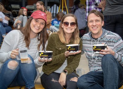 (L-R) Marie Vann, Caitlyn Cole and Caleb Wray dig into some Cup Bop. They’re pleased that Cup Bop offers veggie options like tofu for their bowls. The optional spice levels are nice, too. Photo: John Barkiple