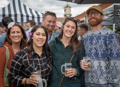 (L-R) Erica Griffin, Eric Jackson, Jessica Christensen, Sierra Burt and Raul Duke are drinking together after hours for the first time. They all work in the same [redacted] operating room. Jackson has good things to say about Proper’s Luau. Photo: John Barkiple