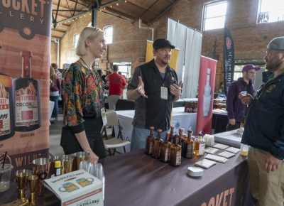 Waterpocket Distillery explaining their product to a participant. Photo: Jayson Ross