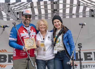 Mayor Jackie Biskupski and Angela H. Brown awarding Kelly Schaefer of Bohemian Brewery with the People's Choice: Best New Brew award! Photo: Jayson Ross