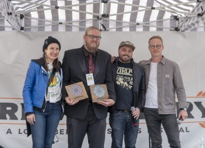 Angela H. Brown, Alexander Ortega and industry professional, Ryan Manning awarding Ethan Miller with the Singular Contribution to Utah Spirits Award. Ana Valdemoros and Angela H. Brown rewarding Holystone Distilling co-owner and distiller Ethan Miller with the People's Choice: Best Brewstillery Cocktail. Photo: Jayson Ross