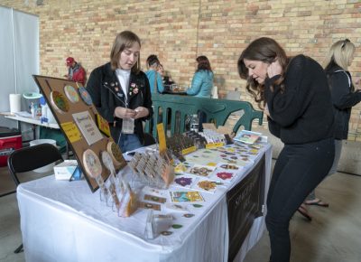 A participant checking out Space Babes Art. Photo: Jayson Ross