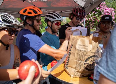 Alicia Chen, first-place finisher Clint Campbell, Pete Watson, Aaron Larson and second-place finisher Carlos Garcia complete an apple-themed task at Mountain West Hard Cider. Chen didn’t expect the 2019 SLUG Cat to sting as much as it did. The headwind and mileage convinced her to bring her fast bike next year—and bib shorts. Photo: Kaylynn Gonazlez