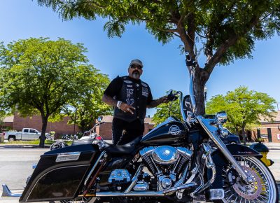 Mike Romero repping it proper next to his dream machine.