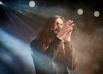 Beacon vocalist Thomas Mularney III bathed in the waning evening sun.